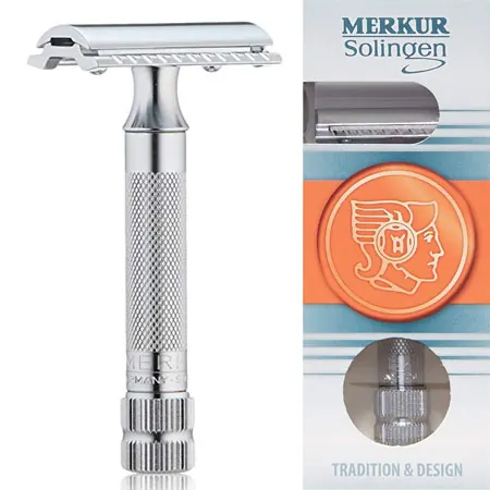 Merkur 34C double-edge safety razor beside its blade packet
